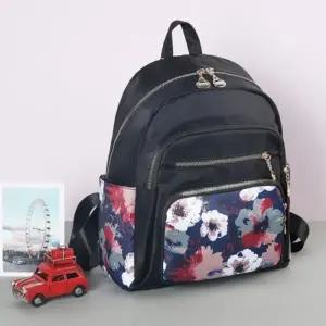 복조리 가방 실버 나일론 여성백팩