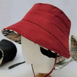 [애슬릿] 겨울 벙거지 모자 여성 귀마개 버킷햇 사파리 와이어 체크