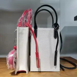 시슬리/애플아울렛/캔버스 미니 크로스백/SCBG33131