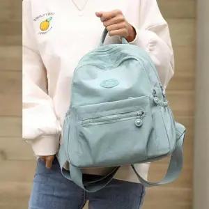여성용 방수 나일론 미니 백팩 보조 포켓 디자인