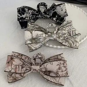 [콩심팥심]꽃무늬 패턴 리본 집게핀 양방향 리본 헤어 패션 코디