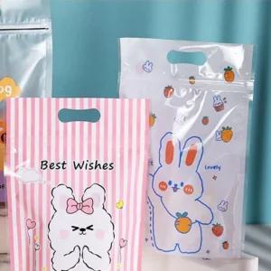 손잡이 선물비닐백 50장 디자인랜덤 간식포 포소포장봉투 답례품포 사탕포 포재료 단체포백 캐릭터팩 포소