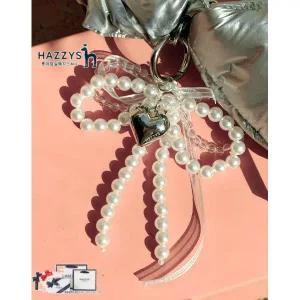 [롯데백화점]헤지스ACC [선물포장] HIHO4F201IV_여성 크림 진주 리본 비즈 가방 참장식 키링