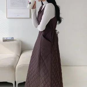 [삐까삐까]퀼팅 누빔 겨울 레이어드 뷔스티에 민소매 롱 원피스 오버핏 뒷리본 라운드_P352744045