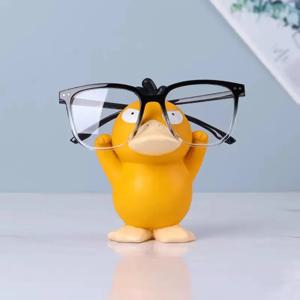 Miniso Anime 주변 장치 귀여운 포켓몬 Psyduck 장식품 안경 프레임 용품 눈 디스플레이 스탠드 장식 공예 스탠드 선물
