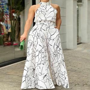여성의 우아한 허리 홀터넥 점프 슈트 캐주얼 프린트 넥타이 민소매 넓은 다리 긴 바지 여름 의류