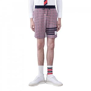 톰 브라운 코튼 체크 자카드 4-바 스웨트쇼츠 MJQ194A J0116 960