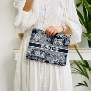 디올 DIORTRAVEL 클러치백 S5440UTEU
