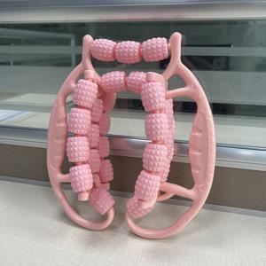 TEMU 29-휠 핑크 레그 마사지기 및 근육 완화 롤러 - 다기능 피트니스 도구, 체중 감량, 발가락 스트레칭 및 휴식에 적합, 내구성이 뛰어난 ABS 소재, 가정용 운동 및 스트레스 감소에 이상적