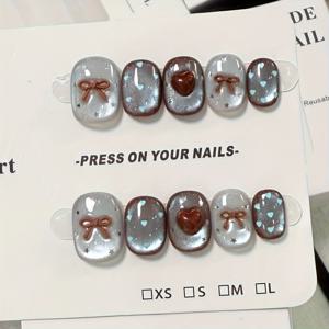 TEMU 10개 세트 블루 하트 도트, 브라운 입체 리본, 별 모양 반짝이 캣아이 프레스, 숏 인조 네일, 데일리 가을 겨울 신상 스타일, 달콤하고 시원한 핫 웨어링 네일, 여성 선물용, 그녀를 위한 선물, 프레스온 네일, 하트 네일, 도트 네일, 광택 마감, 내구성 있는 프레션, 스타일리시 네일, 트렌디 네일, 뷰티 애호가, 여성|네일
