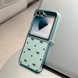 TEMU 삼성 갤럭시 Z 플립 7, Z 플립 5, Z 플립 6용 Y2K 하트 모양의 리본 폰 케이스, 드롭을 방지하기 위한 투명한 소프트 백 커버가 있는 제품입니다.