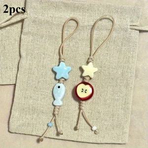 TEMU 2pcs 세라믹 스타 키체인 장식, 귀여운 물고기 및 사과 디자인, 내구성이 뛰어난 폴리에스테르, 휴대폰 케이스, 가방 및 선물에 이상적인 귀여운 키체인 액세서리, 2pcs 세라믹 스타 키체인 장식