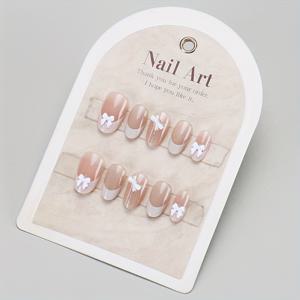 TEMU 10pcs 파스텔 핑크 & 화이트 리본 프레스 온 네일 - 프랑스 고양이 눈 디자인, 여성 및 남성용 풀 커버리지 네일, 진주 액센트가 있는 귀여운 짧은 네일, 캐주얼 의상용 우아한 네일 아트, 귀여운 네일, 귀여운 짧은 네일, 리본 디자인, 프랑스 네일 스타일