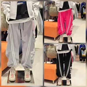 더블제이디 (남녀공용) DBJD 크랙 사선 스트라이프 벌룬핏 조거팬츠 JGZZ80945
