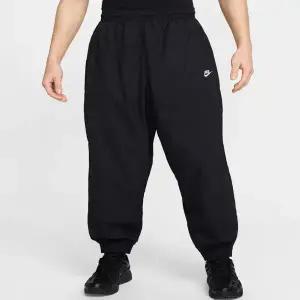 나이키 M 오버사이즈 우븐 트랙 팬츠 DD5 HQ6115 010