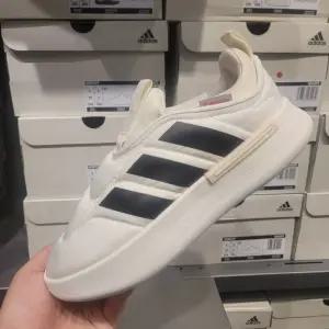 아디다스 패딩 슬립온 남여공용 아디퍼프 겨울 방한화 IG6813