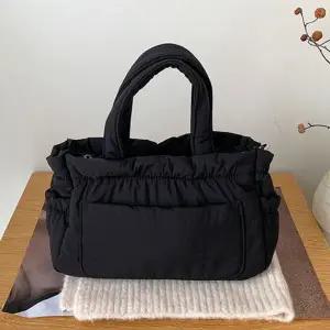 [콩심팥심]여성 데일리 패딩 크로스 토드 백 손목 가방 블랙 손목가방