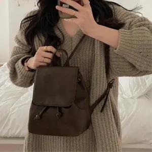 [모드제니] 여성 대학생 직장인 얇은끈 빈티지 미니 백팩 (39180382)