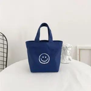 [라일리] Rly 포인트 미니 토트 스마일 캔버스백