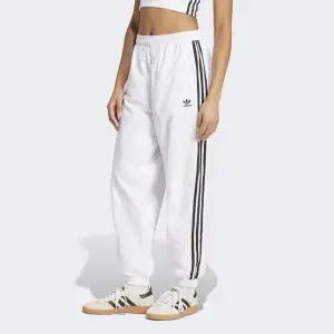 [아디다스]아디컬러 3S 우븐 나일론 커프트 팬츠 JN6122_s