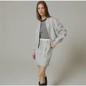 [NICE CLAUP](신세계 사우스시티)오비 변형 턱 미니스커트 N234MWS906