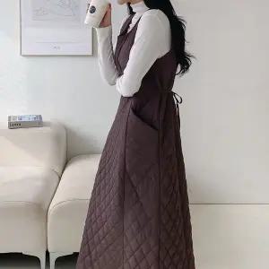 [하프클럽/삐까삐까]퀼팅 누빔 겨울 레이어드 뷔스티에 민소매 롱 원피스 오버핏 뒷리본 라운드