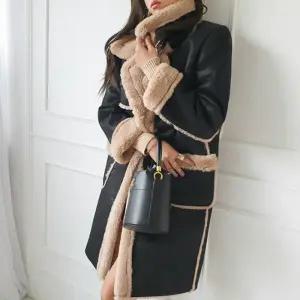 금찌 에디 롱 무스탕 코트 JK5973