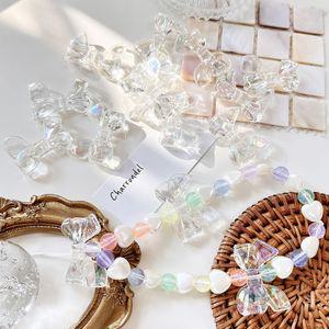 [10개]관통형 32mm 아크릴 오로라투명 꼬임리본 3-524-4 비즈스트랩 키링재료