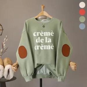 [모노시크] 트랑스 기모 크림 레터링 빵덕 맨투맨_MNTG461