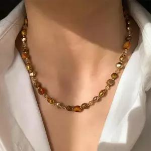 시엘라 브라운스톤 진주 비즈 목걸이