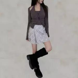 [하프클럽/]여성 캐주얼 대각선 체크 스트랩 플레어 미니스커트