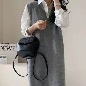 루즈핏 롱 레이어드 브이넥 니트 조끼