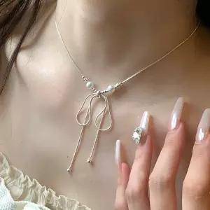 카리브 진주 리본매듭 뱀줄 초커 목걸이