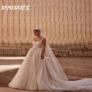 섹시한 스파게티 스트랩 웨딩 드레스 2025 고급스러운 진주 신부 가운 우아한 a 라인 민소매 바닥 길이 가운 맞춤형