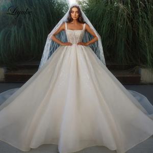 Liyuke 스퀘어 칼라 볼 가운 웨딩 드레스 럭셔리 멋진 구슬 진주 자수 공주 신부 스커트
