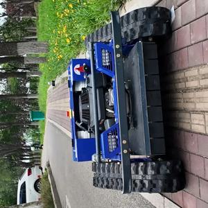 맞춤형 24V 인기 모델, 부드러운 주행 트랙형 무선 제어 잔디 깎는 로봇, 정원 과수원용