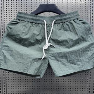 여름 얇은 아이스 실크 빠른 건조 반바지 남성용 루즈핏 큰 사이즈 복서 2024 트렌디 캐주얼 3/4 길이 순색 비치 팬츠