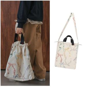 빈2 BZ54AB01YE 아동 공용 옐로우 리본 패턴 가방 에코백 2025년 가을