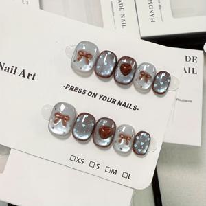 TEMU 10개 세트 블루 하트 도트, 브라운 입체 리본, 별 모양 반짝이 캣아이 프레스, 숏 인조 네일, 데일리 가을 겨울 신상 스타일, 달콤하고 시원한 핫 웨어링 네일, 여성 선물용, 그녀를 위한 선물, 프레스온 네일, 하트 네일, 도트 네일, 광택 마감, 내구성 있는 프레션, 스타일리시 네일, 트렌디 네일, 뷰티 애호가, 여성|네일