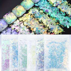 TEMU 6팩이 포함된 60G의 극성 이리디언트 모사 구름 브로데이 글리터, 높은 밝기와 불규칙한 유리 종이, 실리콘 모양을 위한 에폭시 수지 셰이커 필러로 설계되었습니다. DIY 공예 및 보석 캐스팅 용품에 적합합니다.
