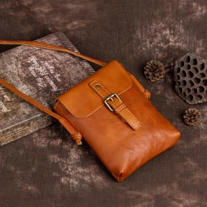 TEMU 빈티지 아티스틱 스타일의 정품 가죽 여성 가방. 식물성 태닝 가죽으로 제작되었으며, 캐주얼하고 다재다능하며 6.7인치 휴대폰에 적합합니다. 숄더백 또는 크로스바디 백으로 착용할 수 있습니다.