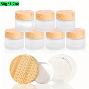 TEMU 8개 세트의 프로스트 유리 병, 0.5 Oz, 1 Oz, 1.7 Oz 사이즈로 제공되며, 나무 질감의 플라스틱 뚜껑이 특징입니다. 이 재사용 가능한 화장품 용기는 로션, 에센셜 오일, 크림, 립밤, 아이섀도우에 적합합니다 (50G, 30G, 15G).