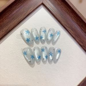 TEMU 10개입 수제 타원형 네일 스티커, 파란색 쿨한 느낌과 손으로 그린 귀여운 별이 특징, 순수 수제 프레스온 네일 스티커, 착용 보조 도구 키트 포함.|네일|네일스티커