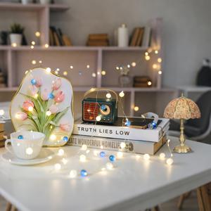 TEMU 세련된 크리스마스 색다른 진주 전구, 생생한 비즈와 불꽃놀이처럼 생긴 장식 스트링 라이트, 그리고 갈랜드 조명이 특징입니다. 가정, 침실, 거실 및 트리 장식에 적합하며 다양한 장소에 완벽하게 어울립니다.