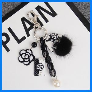 우아한 럭셔리 동백 꽃 Bowknot 지갑 모피 공 진주 키 체인 여자 여자 열쇠 고리 반지 자동차 가방 Pendent