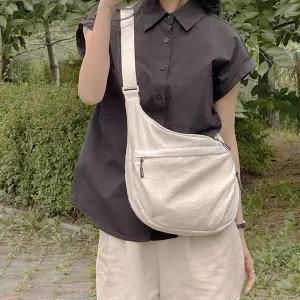 트래블라라 반달 여행용 크로스백 해외 미니백 가벼운가방 슬링백 크로와상백