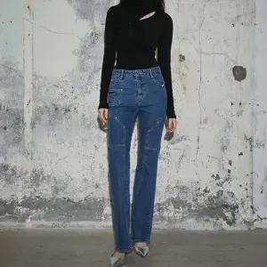 [롯데백화점]에고이스트 [HERITAGE] 라벨 포인트 절개 부츠컷 데님 팬츠 (EQ4DP160)