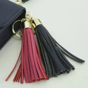 아멜리 소가죽 태슬장식 테슬 키링 W685747