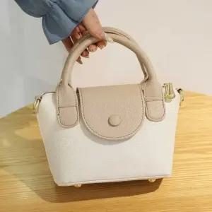 톤 배색 핸들 미니 토트백 여성 데일리 정장 캐주얼 (WFK5UET)