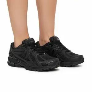 [뉴발란스] 꼼데가르송 옴므 1906R 블랙 스니커즈